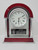 Rosewood Pino-Finish Mantle Clock with Chrome Plated Posts and Silver Aluminum Accents