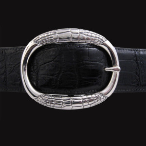 Sterling Silver Oval Alligator Print Garrison Buckle. Crafted from sterling silver, this buckle features an oval shape with intricate detailing, adding a touch of elegance to any outfit. JWCooper.com