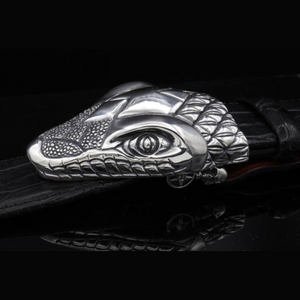 Sterling Silver Snake Head Buckle. Crafted from sterling silver, this buckle features a detailed snake head design, symbolizing wisdom and transformation. JWCooper.com