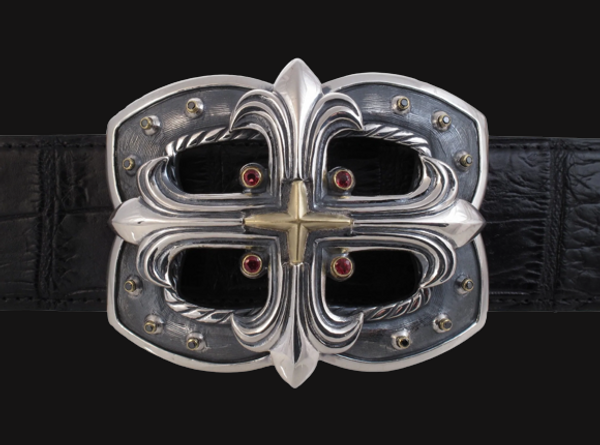 The Sterling Gothic Cross Design is a striking piece of jewelry that exudes sophistication and bold style with 18K, sapphires & diamonds. jwcooper.com