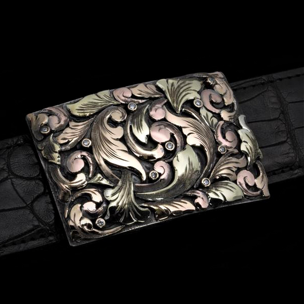 Handmade Sterling Silver Buckle adorned with stunning 3D Overlays in Sterling, Yellow, Green, and Rose 14K Gold, accented by dazzling Diamonds.  JWCooper.com