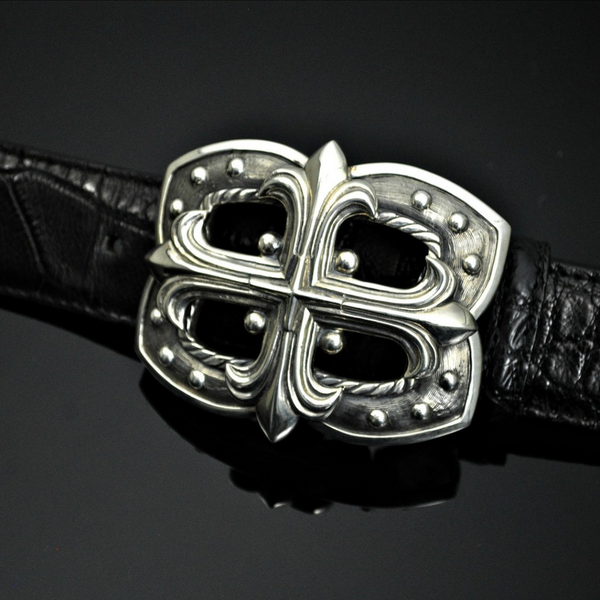 Sterling Silver Cross Buckle. Crafted with intricate detailing, this buckle features a cross design that symbolizes spirituality and devotion. JWCooper.com