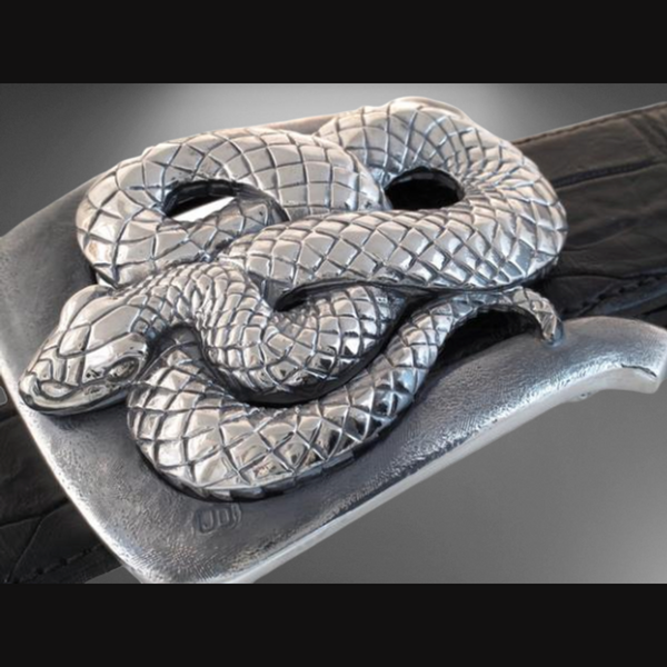 Sterling Silver Snake Buckle. Crafted from high-quality sterling silver, this buckle features a captivating snake design, showcasing intricate details and a polished finish. JWCooper.com