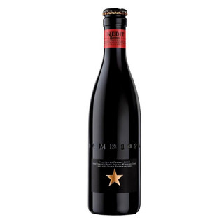 A single black bottle of Estrella Damm Inedit. The bottle is embossed with Estrella with a gold star towards the bottom. A single black bottle of Estrella Damm Inedit. The bottle is embossed with Estrella with a gold star towards the bottom.