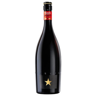 A single tall black bottle of Estrella Damm Inedit. The bottle is embossed with Estrella with a gold star towards the bottom.