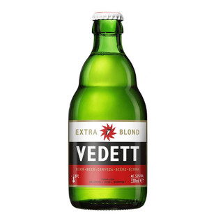 A single green bottle with a striped white, black and red label in the middle. The Vedett name is written in the centre.