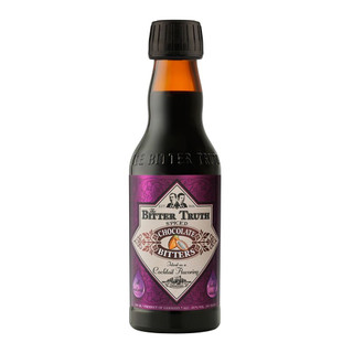 A single amber-hued bottle with The Bitter Truth embossed above the purple label. In the centre is written Chocolate Bitters.