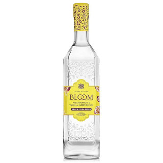 A single transparent bottle with a floral yellow foil closure, the yellow label showcases the Bloom name in dark letters.