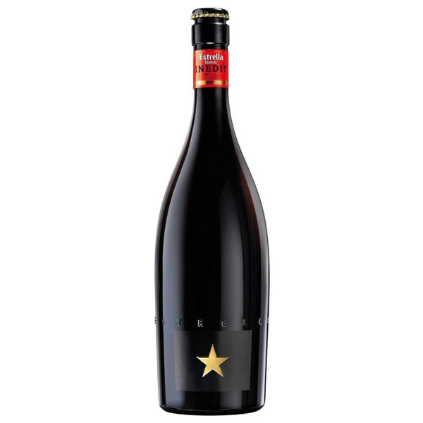 A single tall black bottle of Estrella Damm Inedit. The bottle is embossed with Estrella with a gold star towards the bottom.