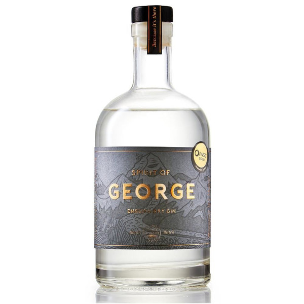 A single transparent bottle with a grey label, depicting English mountains. The Spirit of George is written in gold.
