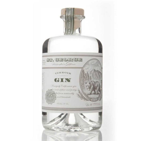 A single transparent short bottle that is wrapped in a white label around the centre with an image of a bear and mountain.