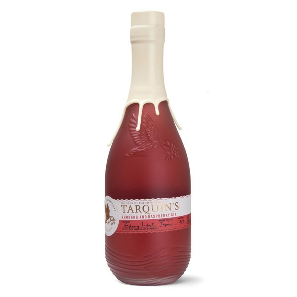 A single frosted dark pink bottle with a white wax seal that drips down the neck. The Tarquins name is written in gold.