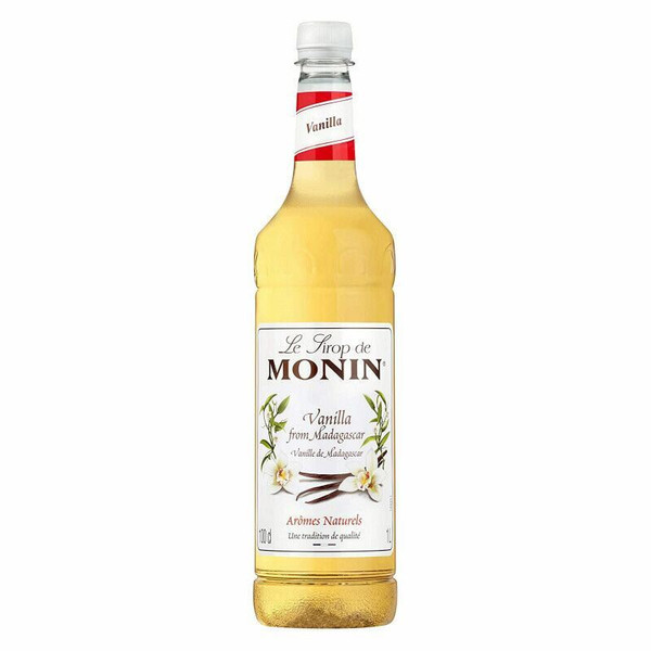 A 1ltr clear glass bottle with white label and top showing a picture of vanilla of Monin Vanilla syrup