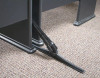A sidewinder tool slotting perfectly between two table legs.