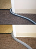 Two pictures showing a hose pulled around a corner with hose sock on in bottom picture and without hose sock on in top picture.