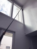 Reach with Sidewinder brush cleaning window sill two stories up.