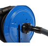 Close-up view of blue hose reel with vacuum linking hose connected.
