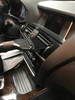 Dust brush cleaning car AC vent.