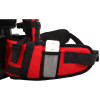 On/off remote sitting in mesh pocket on backpack vacuum harness.