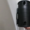 Hanging Aeon vacuum onto wall bracket.