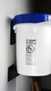 Side view of bucket mounted onto wall.