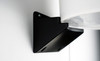 Bottom black plastic wall mount holding up a bucket.
