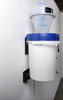 Side view of Quick Click separator bucket mounted onto white wall.