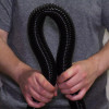 Flexing a black Cen-Tec hose.