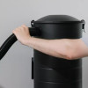 Connecting hose to Aeon vacuum.