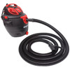 Black hose attached to a utility vacuum.