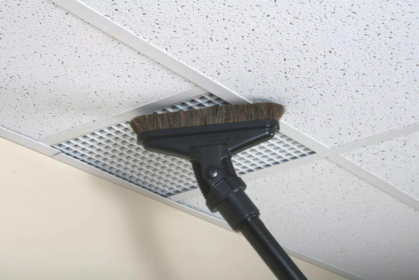 8 inch Sidewinder brush cleaning a ceiling vent.