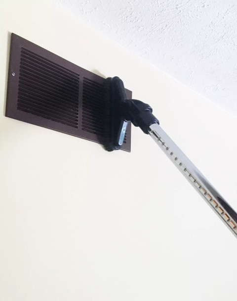 8 inch Sidewinder brush cleaning an AC vent.
