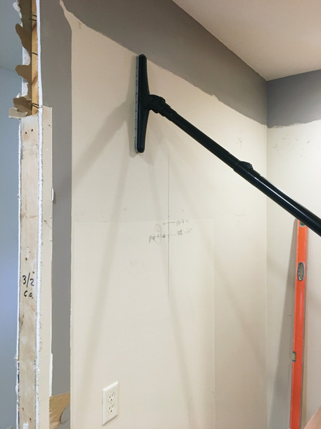 Felt brush Sidewinder tool cleaning drywall.