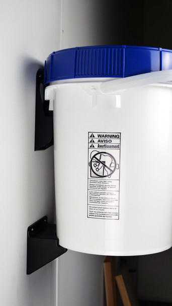 Side view of bucket mounted onto wall.