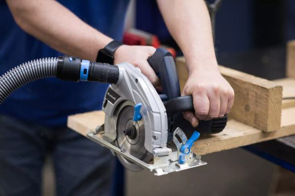 Quick Click hose and adapter attached to circular saw. Quick Click hose and adapter attached to circular saw.