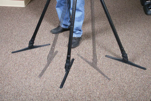 An image showing the more sweeping like motion used when using a sidewinder instead of the standard push and pull method of other floor tools.