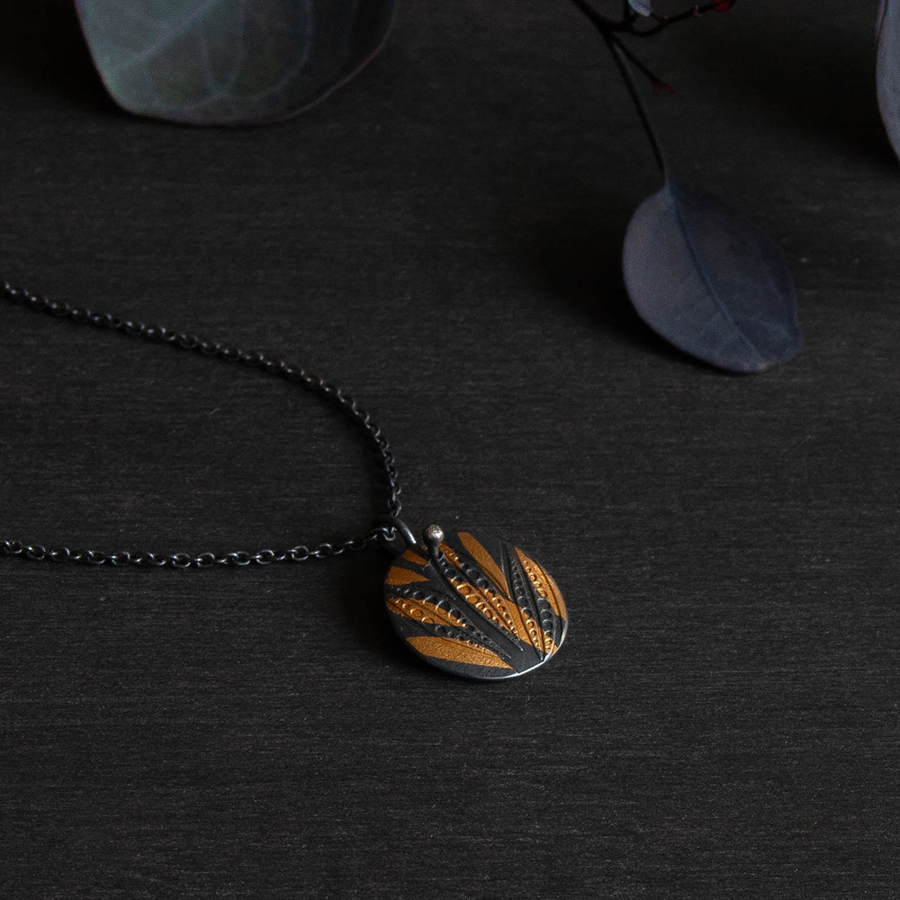Golden leaves small round pendant - 24ct gold and silver