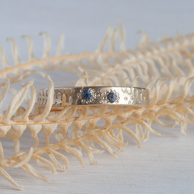 Narrow 9ct gold fern ring with sapphires