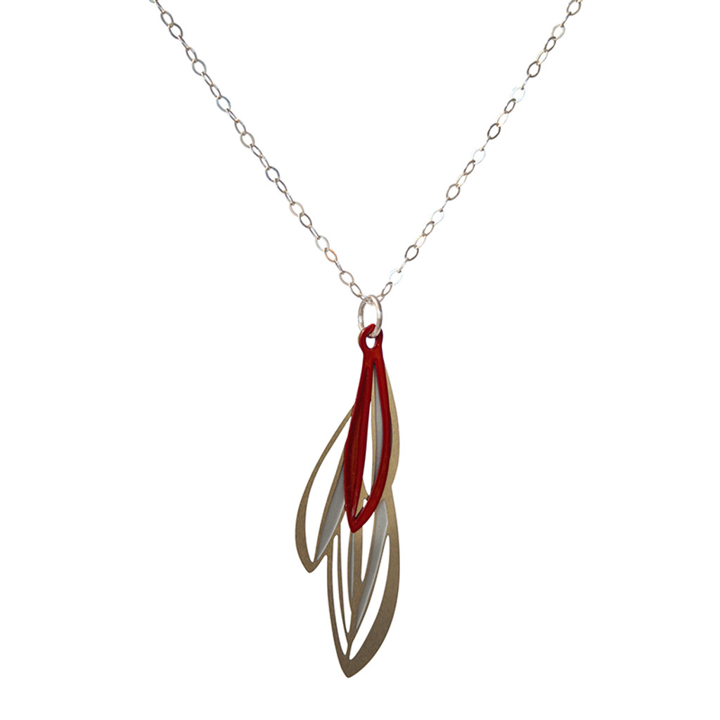 Elegant layered leaf pendant based on the varied leaves of native Eremophila plants

Made from stainless steel with contrasting powdercoated red colour and raw steel