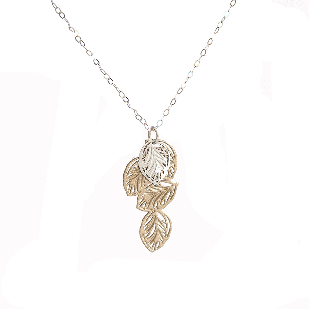 Lots of leaves pendant gold & silver
