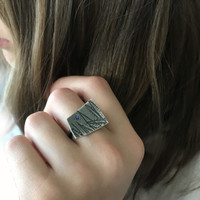 Banksia ring with sapphire