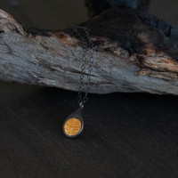 Fern gold and silver small tear drop pendant