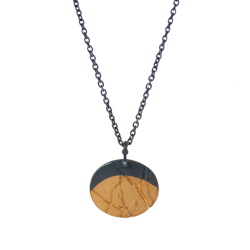 Moonrise gold and silver pendant