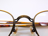 Retro eyewear with engraved detail in antique gold at www.theoldglassesshop.co.uk