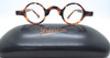 Preciosa Small round old fashioned prescription glasses.