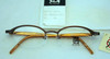 Jean Paul Gaultier 0013 Half Rim Oval Spectacles In A Bronze Finish 48mm Lens Size