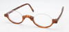 Light brown acetate lower half rimmed eyewear by Schnuchel at www.theoldglassesshop.co.uk
