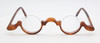 Schnuchel 1157 lower half rimmed light brown acetate spectacles at The Old Glasses Shop Ltd