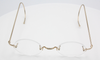 Rimless True Round Prescription Glasses By Beuren With Saddle Bridge And Curlside Arms 40mm-50mm Lens Size