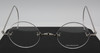 Rimless True Round Glasses By Beuren With Saddle Bridge And Curlside Arms In A Shiny Silver Finish 40mm-50mm Lens Size